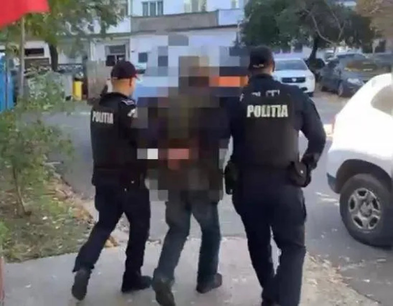 Bărbat din Craiova reținut după ce a furat o sticlă de băutură și a agresat un agent de pază